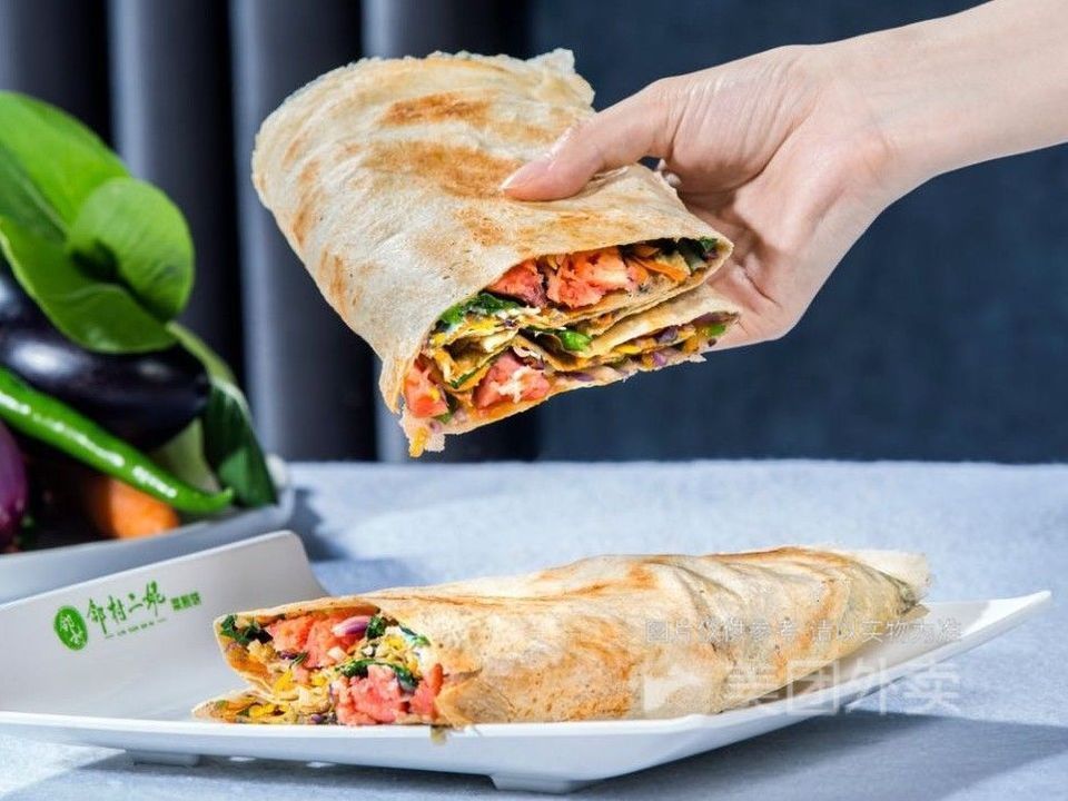 推荐菜:介绍:地址(在哪里):邻村二妮·菜煎饼(妙桥店)位于苏州市