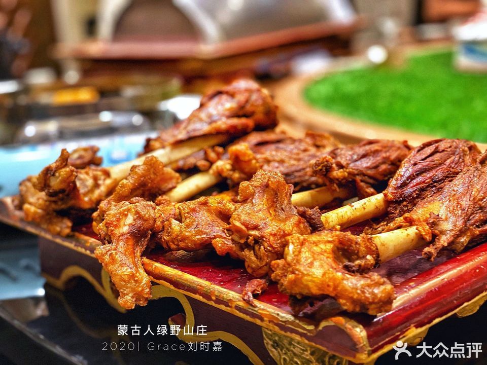 手抓小羊腿图片