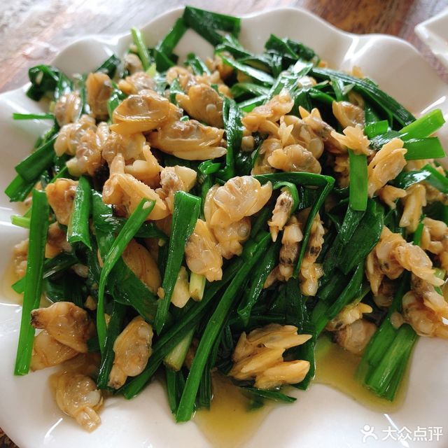 韭菜炒螺肉图片