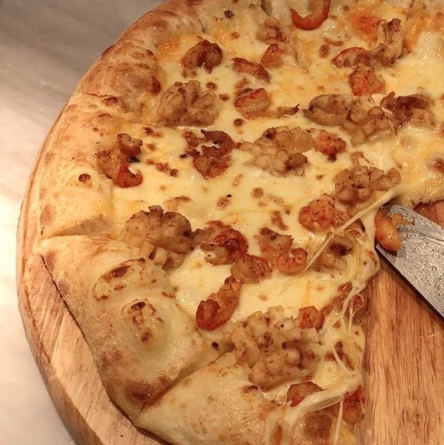 榴莲披萨推荐菜:介绍:地址(在哪里):比格比萨自助(房山龙湖天街店)