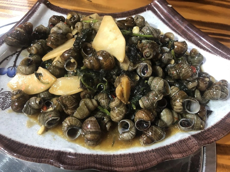 紫苏酸笋炒石螺图片