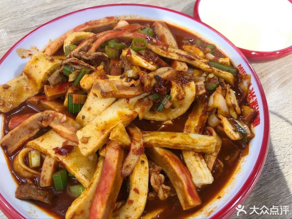 秘制牛肉炒鱼排蟹排图片