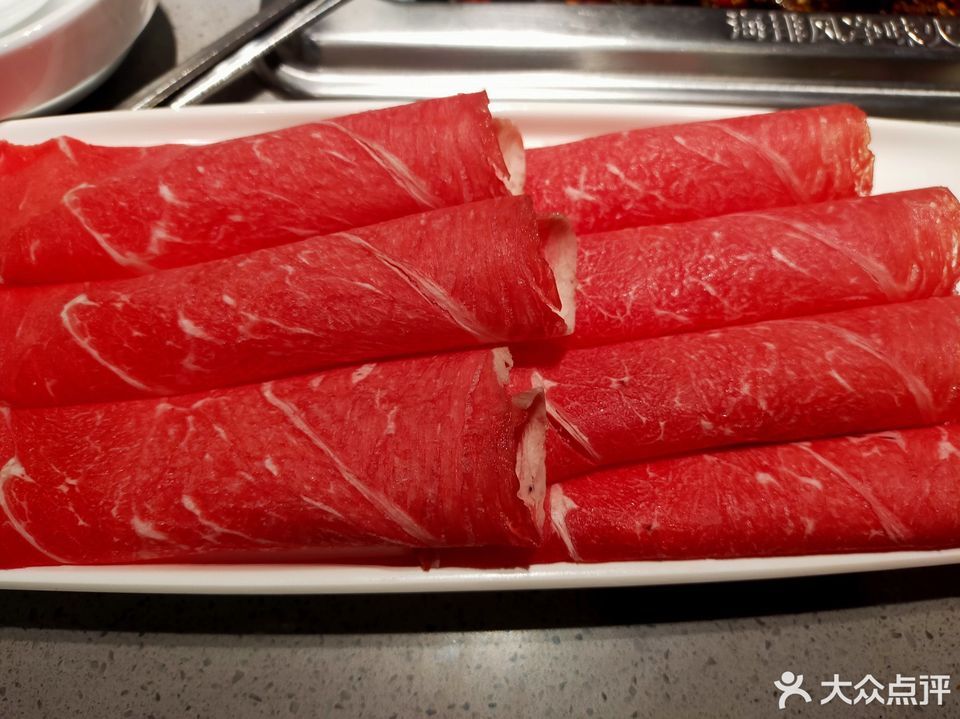 牛肉粒番茄锅底推荐菜:介绍:地址(在哪里):海底捞火锅(上城天街店)