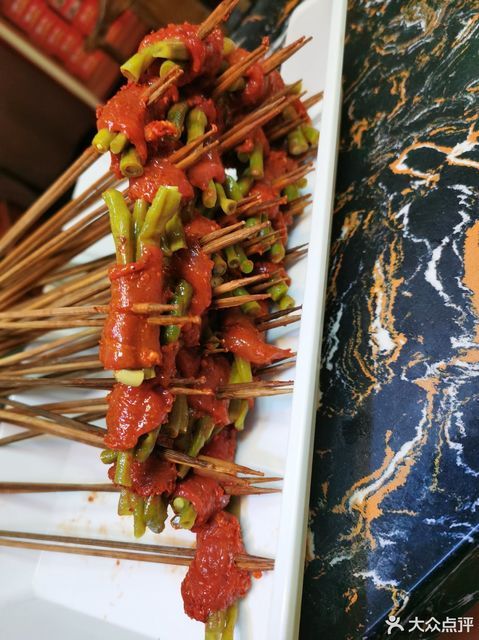 酸豆角牛肉串图片