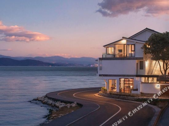 镇龙龛下登村2组198号大理柒朵花园海景客栈大理洱朵花园海景酒店包括