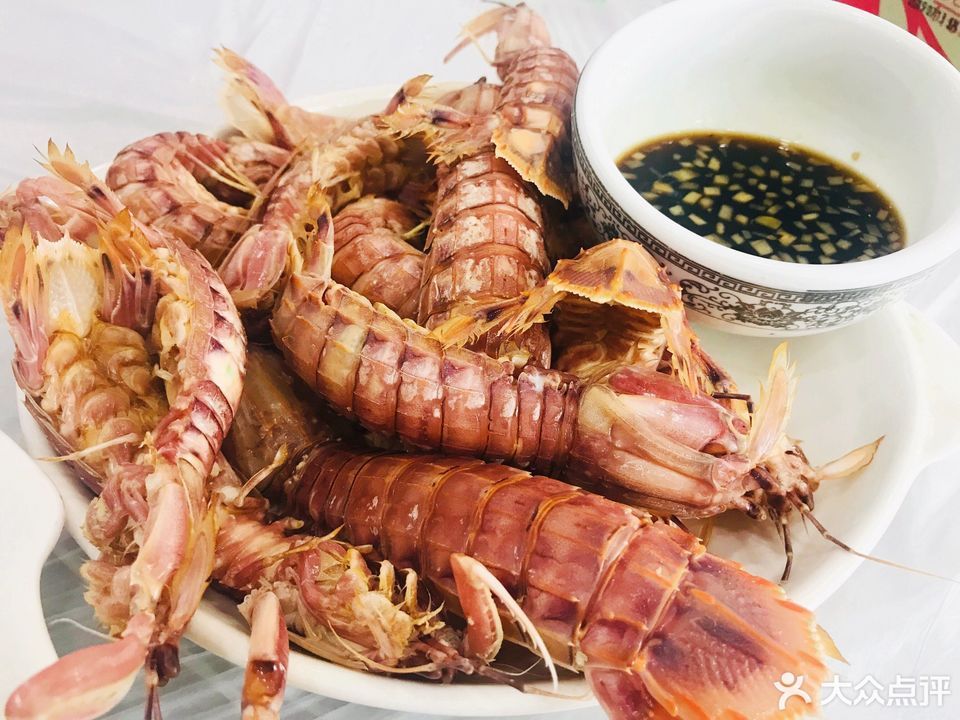 北塘河洛海鲜饭庄抗震路店