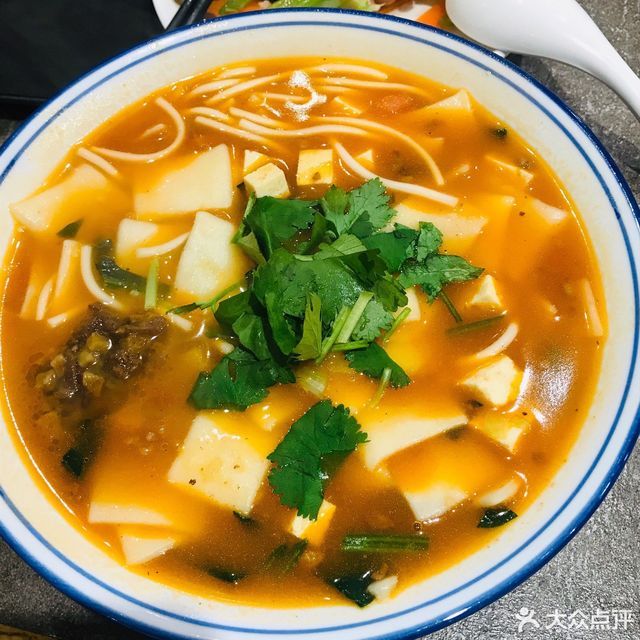 西部红手工羊肉面片空港店