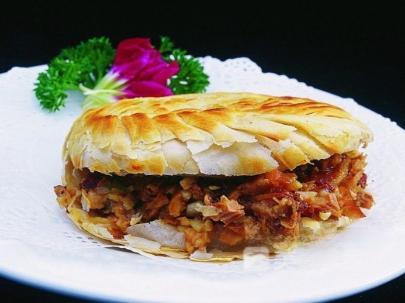 彪哥酸辣粉肉夹馍图片