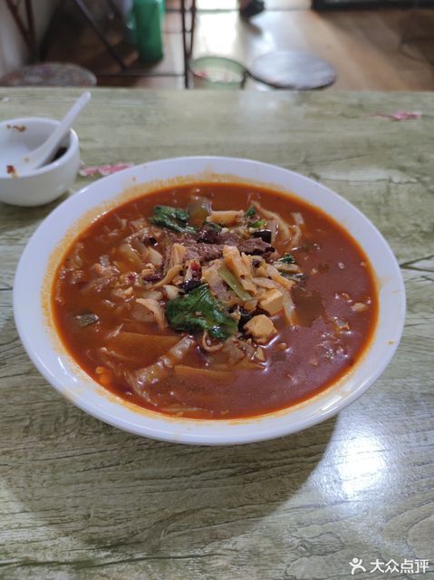 水煮牛肉烩饼图片