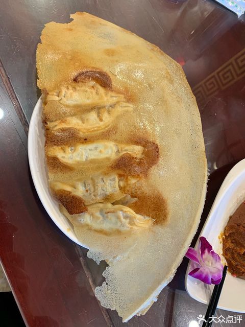 邢家锅贴迎宾路西站店